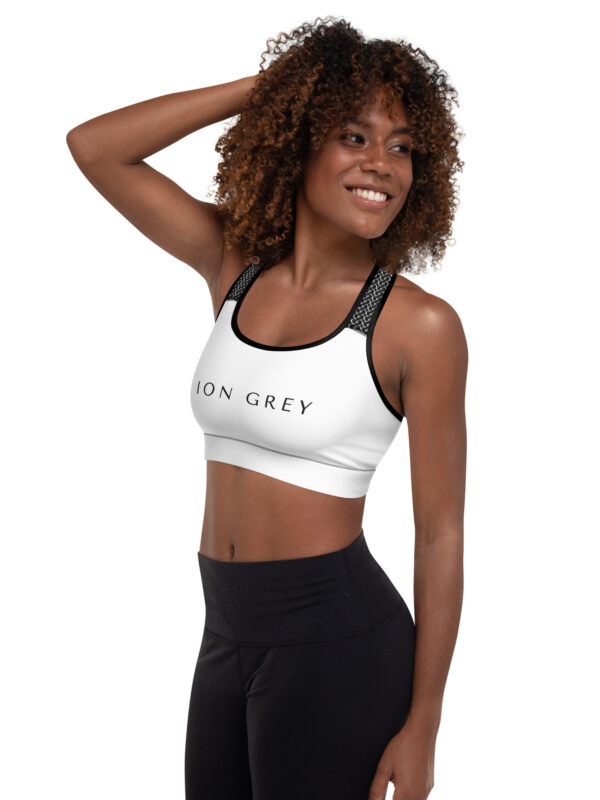 all-over-print-padded-sports-bra-black-left-6603e49ab1fd0.jpg