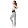 all-over-print-recycled-crossover-leggings-with-pockets-white-left-65fa6334189a4.jpg