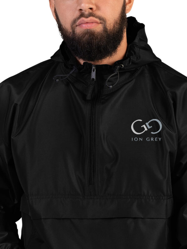 embroidered-champion-packable-jacket-black-zoomed-in-65f6f8d3be1fe.jpg